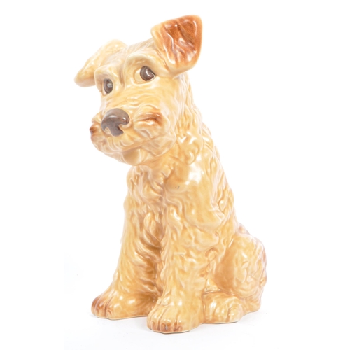 41 - Sylvac - A large mid century ceramic Sylvac figure in the form of a brown terrier dog. The dog in si... 