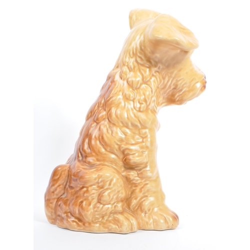 41 - Sylvac - A large mid century ceramic Sylvac figure in the form of a brown terrier dog. The dog in si... 