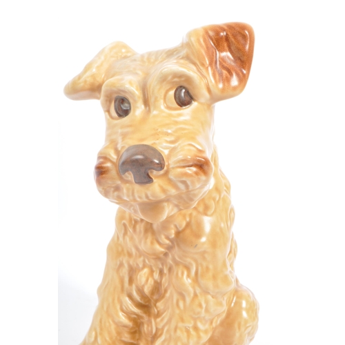 41 - Sylvac - A large mid century ceramic Sylvac figure in the form of a brown terrier dog. The dog in si... 