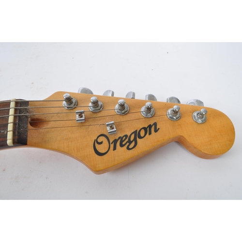 412 - Oregon - A vintage 20th century electric guitar. With maker mark to top, with brass inlaid frets, wh... 