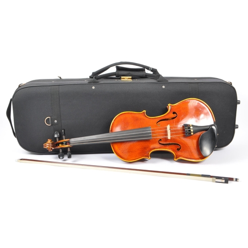 414 - Hidersine Piacenza - A 20th Century two piece back flamed maple finish 4/4 full sized violin with fi... 