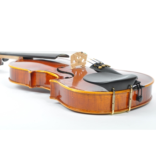 414 - Hidersine Piacenza - A 20th Century two piece back flamed maple finish 4/4 full sized violin with fi... 