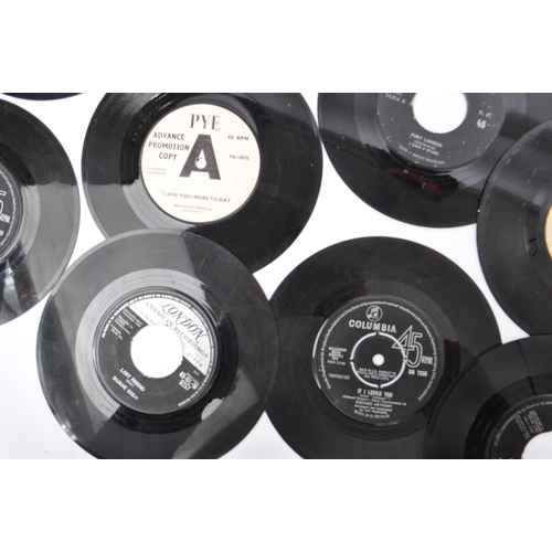 424 - A collection of  60+ vintage and later 20th century 45 RPM singles vinyl records. To include; The Ki... 