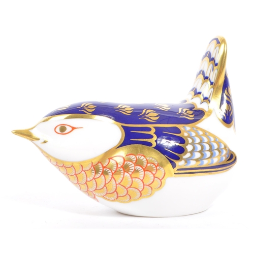 45 - Royal Crown Derby - A contemporary porcelain china paperweights in the form of a Wren with gilt stop... 