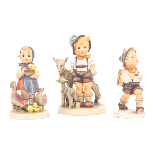 51 - W. Goebel - Three mid 20th century German W. Goebel figurines. The collection to include a 'Shepherd... 