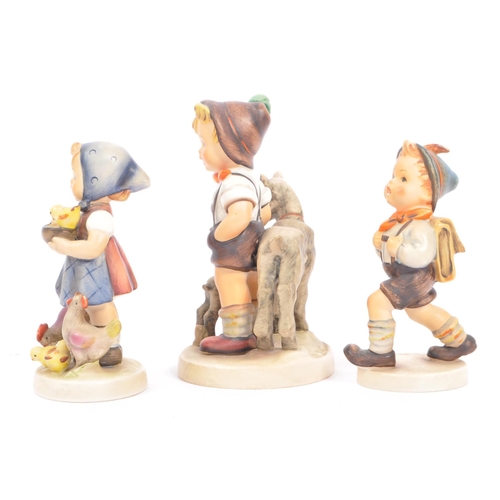 51 - W. Goebel - Three mid 20th century German W. Goebel figurines. The collection to include a 'Shepherd... 