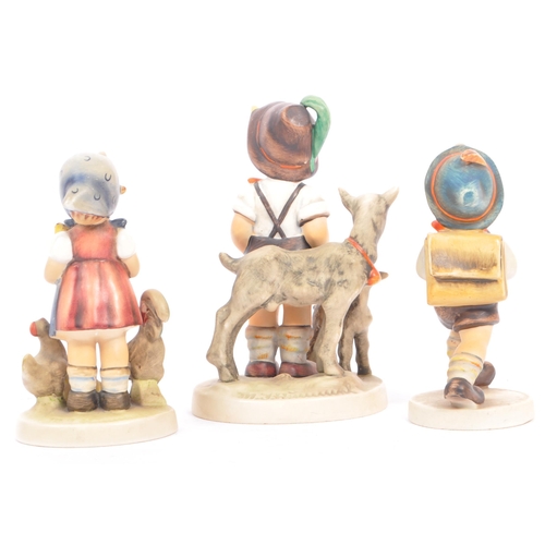 51 - W. Goebel - Three mid 20th century German W. Goebel figurines. The collection to include a 'Shepherd... 