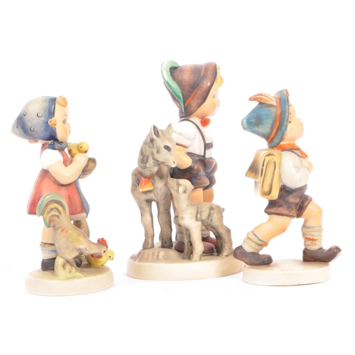 51 - W. Goebel - Three mid 20th century German W. Goebel figurines. The collection to include a 'Shepherd... 