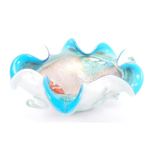 53 - A mid 20th century Murano studio art glass centerpiece dish. The hand made dish of rolled deign with... 