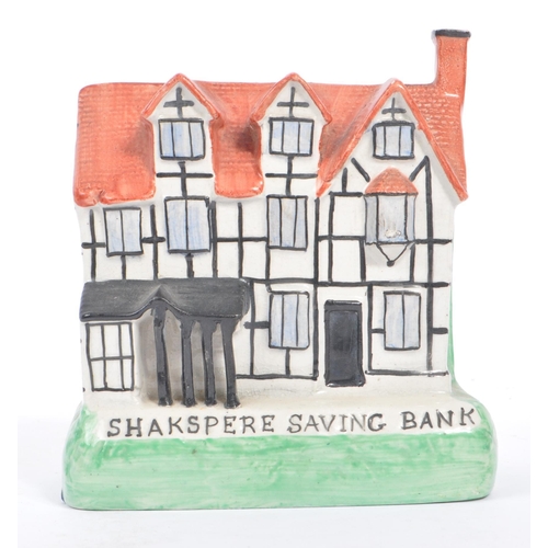 56 - A Victorian circa. 1900 Staffordshire hand painted ‘Shakespeare’ Saving Bank china money box. Modell... 