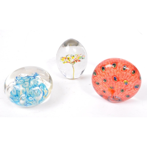 64 - A large collection of assorted mid century / vintage studio art glass paperweights. Comprising of mu... 