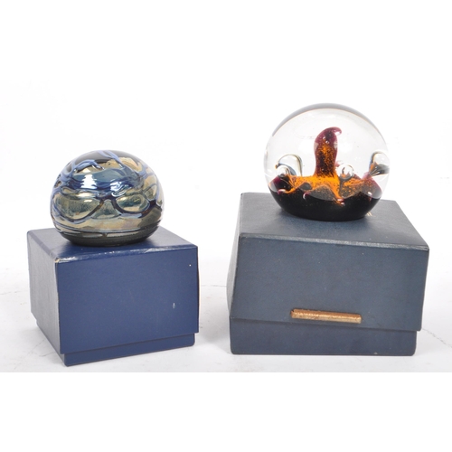 64 - A large collection of assorted mid century / vintage studio art glass paperweights. Comprising of mu... 