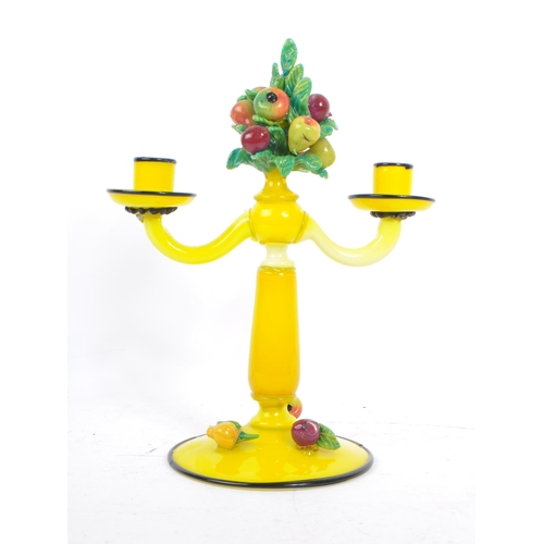 71 - A vintage 20th century Murano / Venetian manner art glass candelabra / candle stick. The candelabra ... 