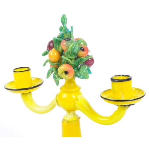 71 - A vintage 20th century Murano / Venetian manner art glass candelabra / candle stick. The candelabra ... 