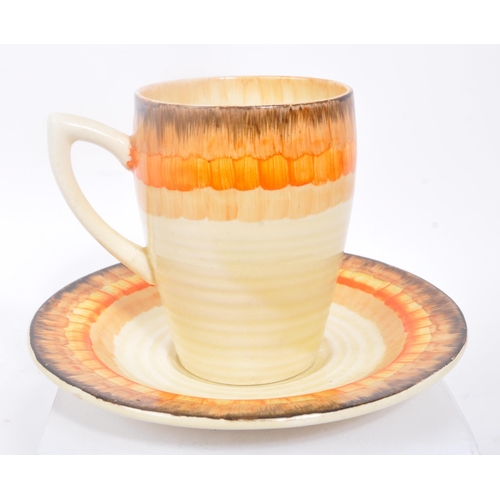 80 - Clarice Cliff - An early 20th Century porcelain 1930s art deco Clarice Cliff Bizarre design teacup a... 