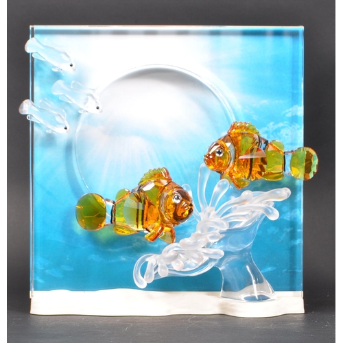 86 - Swarovski - A collection of boxed Swarovski crystal decorative marine life pieces. The collection to... 