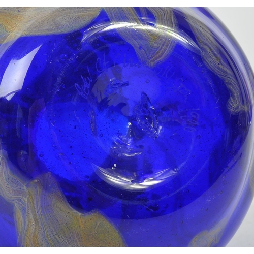 87 - A collection of mid 20th century studio art glass. The collection to include a Mdina glass bowl in t... 