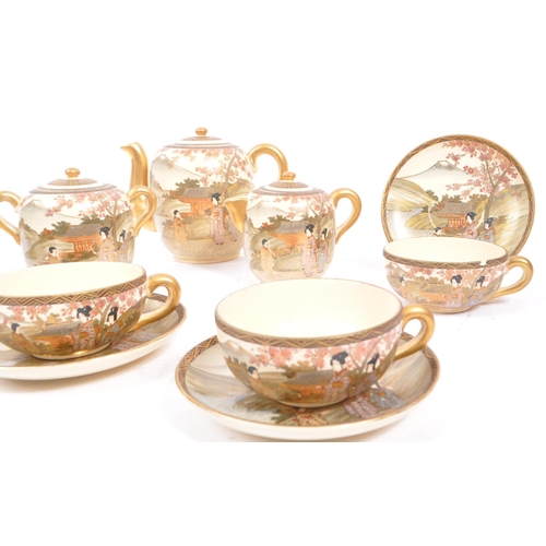 84 - A 20th Century Japanese Satsuma hand painted ceramic tea service to include teapot and four teacups ... 