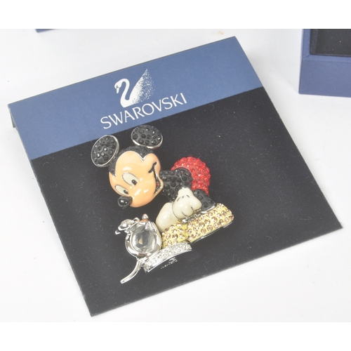 93 - Disney - Swarovski - A collection of Swarovski / Disney crystal jewellery items. The collection to i... 