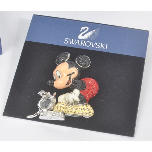 93 - Disney - Swarovski - A collection of Swarovski / Disney crystal jewellery items. The collection to i... 