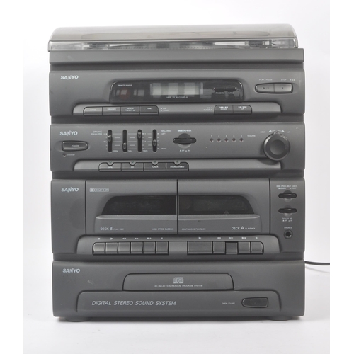 419 - Sanyo - A late 20th century Sanyo digital stereo sound system. Featuring dual tape cassette player, ... 