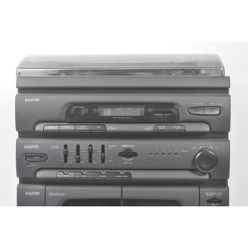 419 - Sanyo - A late 20th century Sanyo digital stereo sound system. Featuring dual tape cassette player, ... 