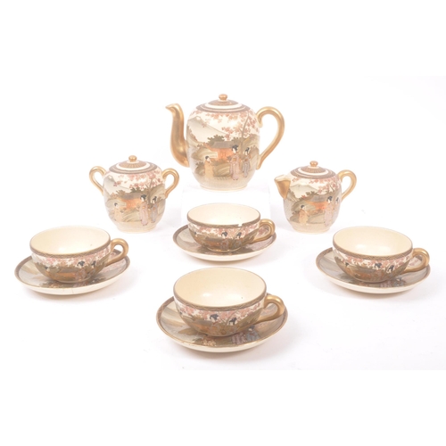 84 - A 20th Century Japanese Satsuma hand painted ceramic tea service to include teapot and four teacups ... 