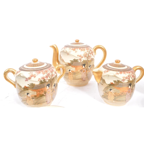 84 - A 20th Century Japanese Satsuma hand painted ceramic tea service to include teapot and four teacups ... 