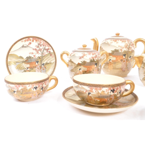 84 - A 20th Century Japanese Satsuma hand painted ceramic tea service to include teapot and four teacups ... 