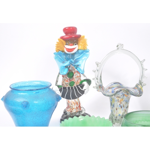 144 - A collection of mid 20th Century glass to include bowls, vases, glass baskets and a clown figure. So... 