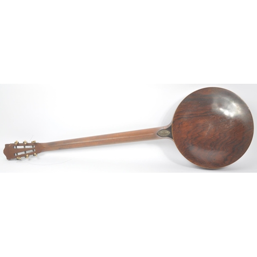 418 - Windsor - An early 20th Century five string New Windsor Banjo, comprising of a walnut neck with ebon... 