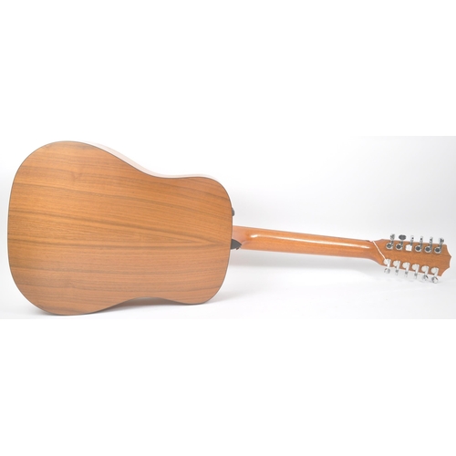 422 - Taylor - A contemporary electro acoustic left handed twelve stringed guitar. Model number 150e, seri... 