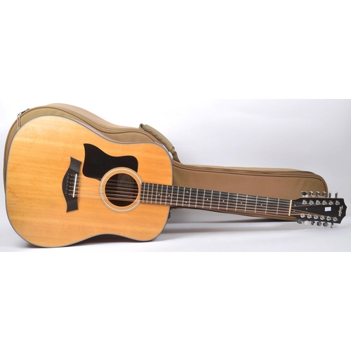 422 - Taylor - A contemporary electro acoustic left handed twelve stringed guitar. Model number 150e, seri... 