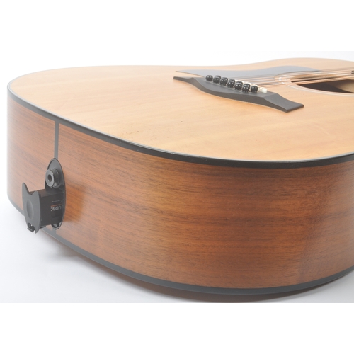 422 - Taylor - A contemporary electro acoustic left handed twelve stringed guitar. Model number 150e, seri... 