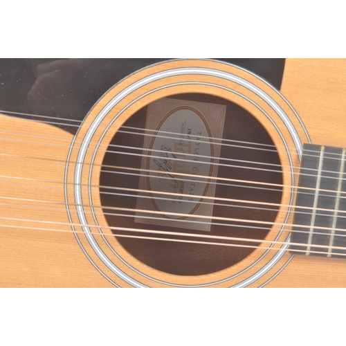 422 - Taylor - A contemporary electro acoustic left handed twelve stringed guitar. Model number 150e, seri... 