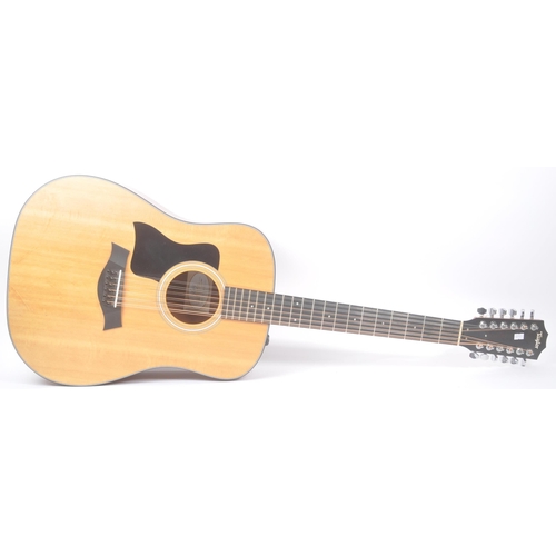 422 - Taylor - A contemporary electro acoustic left handed twelve stringed guitar. Model number 150e, seri... 