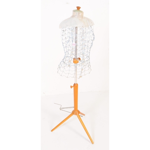 564 - Adjustoform - A mid 20th century Adjustoform wire adjustable dressmakers form haberdashery shop disp... 