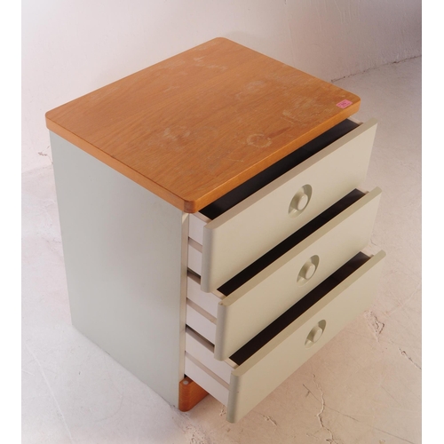 579 - Stag Furniture - A retro late 20th century low chest of drawers. Raised on a plinth base with lamina... 