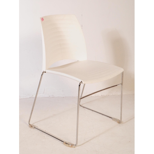 586 - Frovi - A set of three mid 20th century canteen / bistro / café dining chairs. Having moulded white ... 