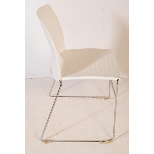 586 - Frovi - A set of three mid 20th century canteen / bistro / café dining chairs. Having moulded white ... 