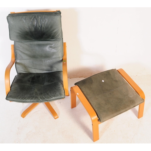 589 - 20th century Ikea bentwood and leather Poang swivel armchair and ottoman. The bentwood frame with fi... 