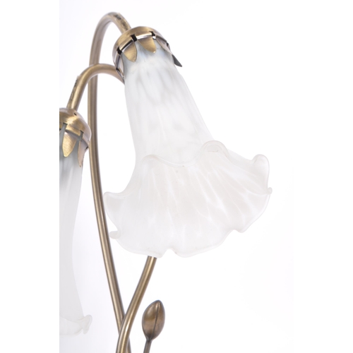 594 - A later 20th century Art Nouveau style design table lamp. Modelled lily leaf base with two frosted g... 