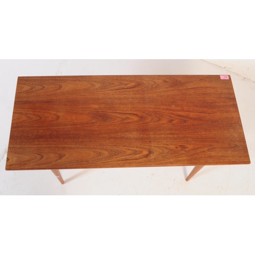 595 - British Modern Design - A mid 20th century teak coffee occasional table. Of rectangular form with ta... 