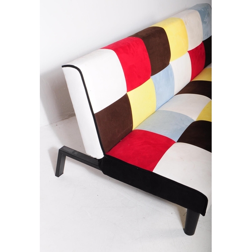 608 - A contemporary fold down klik klak sofa bed / sofa settee. Of patch work design with colour blocks. ... 