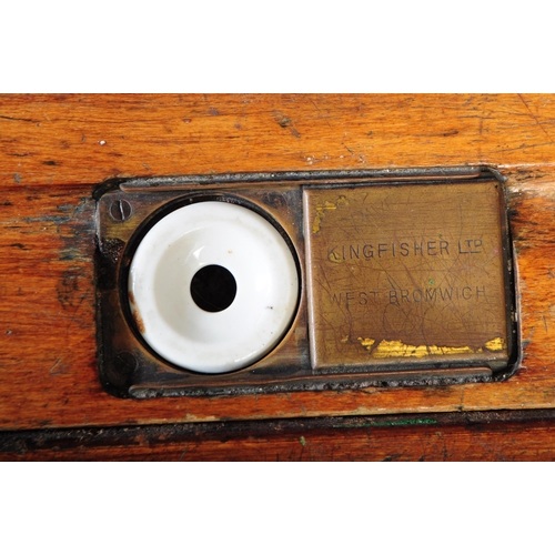 609 - A mid 20th century circa 1940s light oak school desk having hinged top with sliding brass inkwell st... 