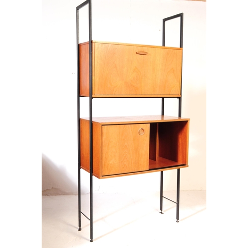 612 - Avalon - A mid 20th century Avalon ladderax manner modular wall unit shelving system. The unit of re... 