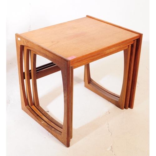 615 - G-Plan - A mid 20th century G Plan teak wood quadrille nest of tables. The nest consisting of a set ... 