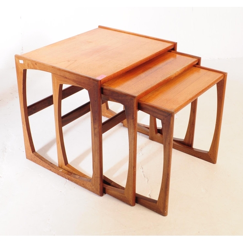 615 - G-Plan - A mid 20th century G Plan teak wood quadrille nest of tables. The nest consisting of a set ... 