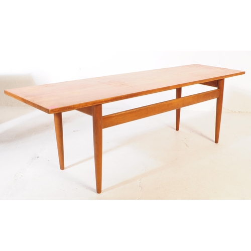 616 - Scandart Furniture - A mid 20th century Scandart teak long john coffee table. The table of rectangul... 