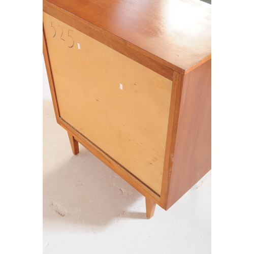 617 - British Modern Design - A mid 20th century teak wood chest of drawers. The chest of drawers raised o... 